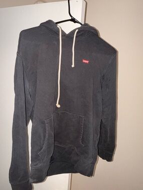 Levi's Black Hoodie with Cream Drawstrings and Red Logo